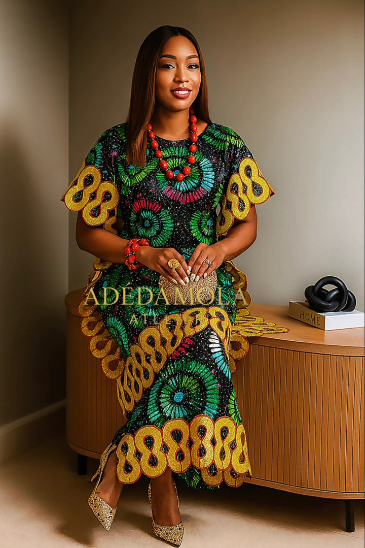A colourful African-inspired outfit with green, red and gold detailing.