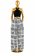 Men's Ankara wide-leg cargo pants in neon green zigzag mudcloth tribal print on deep black with large patch pockets