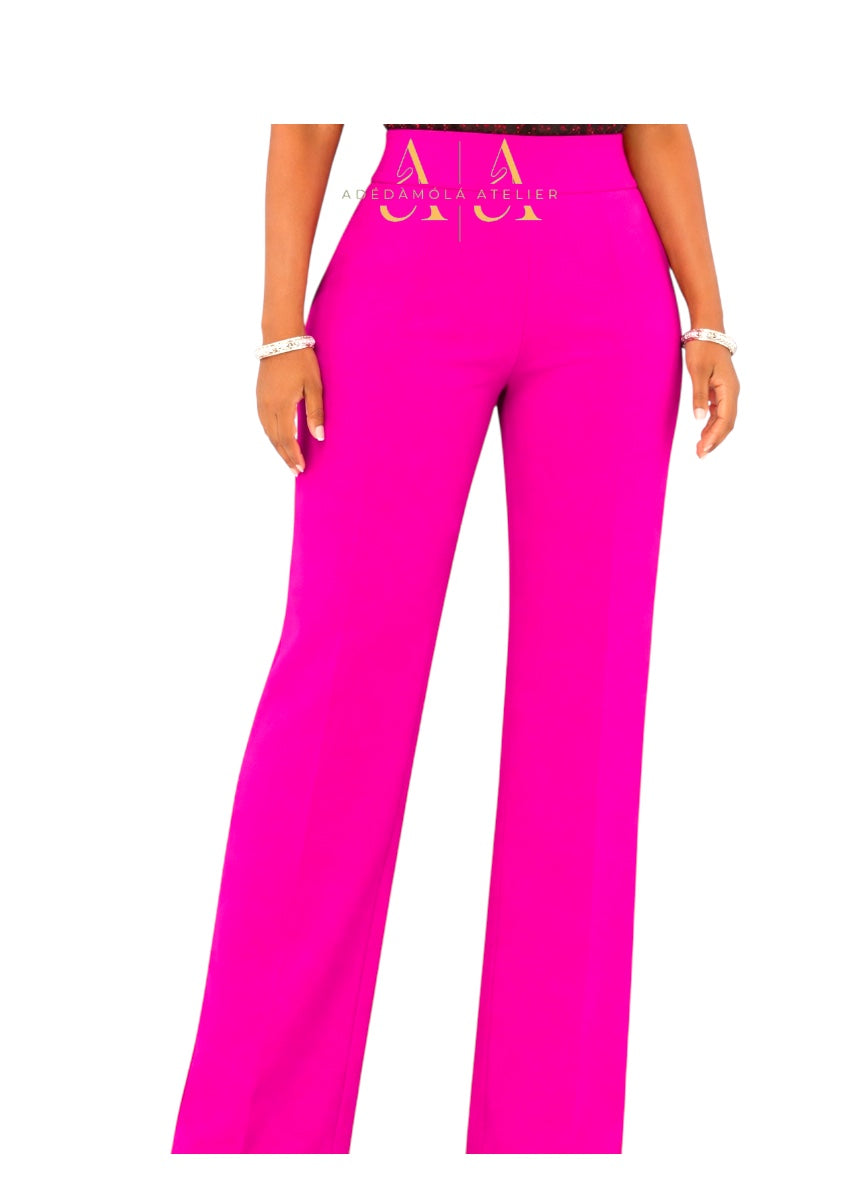 Bright pink pants with a brand logo on a white background