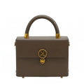 Royale mini trunk bag by Adedamola Atelier – chocolate brown structured vegan leather crossbody with gold twist-lock hardware, Edmonton Canada