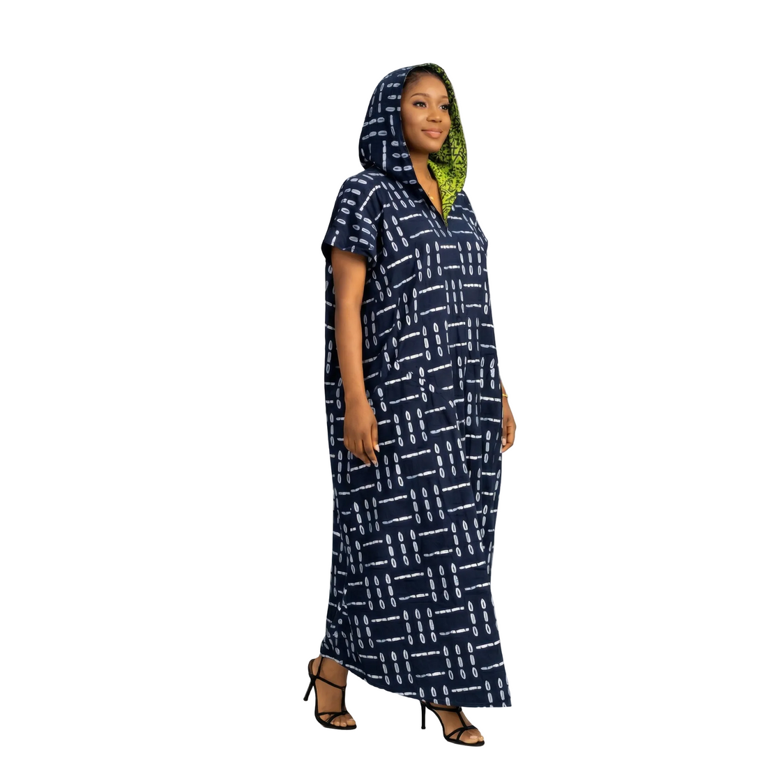 Close-up of the premium Ankara African fabric on the Aṣọ̀jú women's hooded maxi gown, showcasing the intricate bold patterns and high-quality finish.