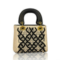 Woven mini shoulder bag from Heritage Collection by Adedamola Atelier – black and cream luxury handbag with gold hardware, Edmonton Canada