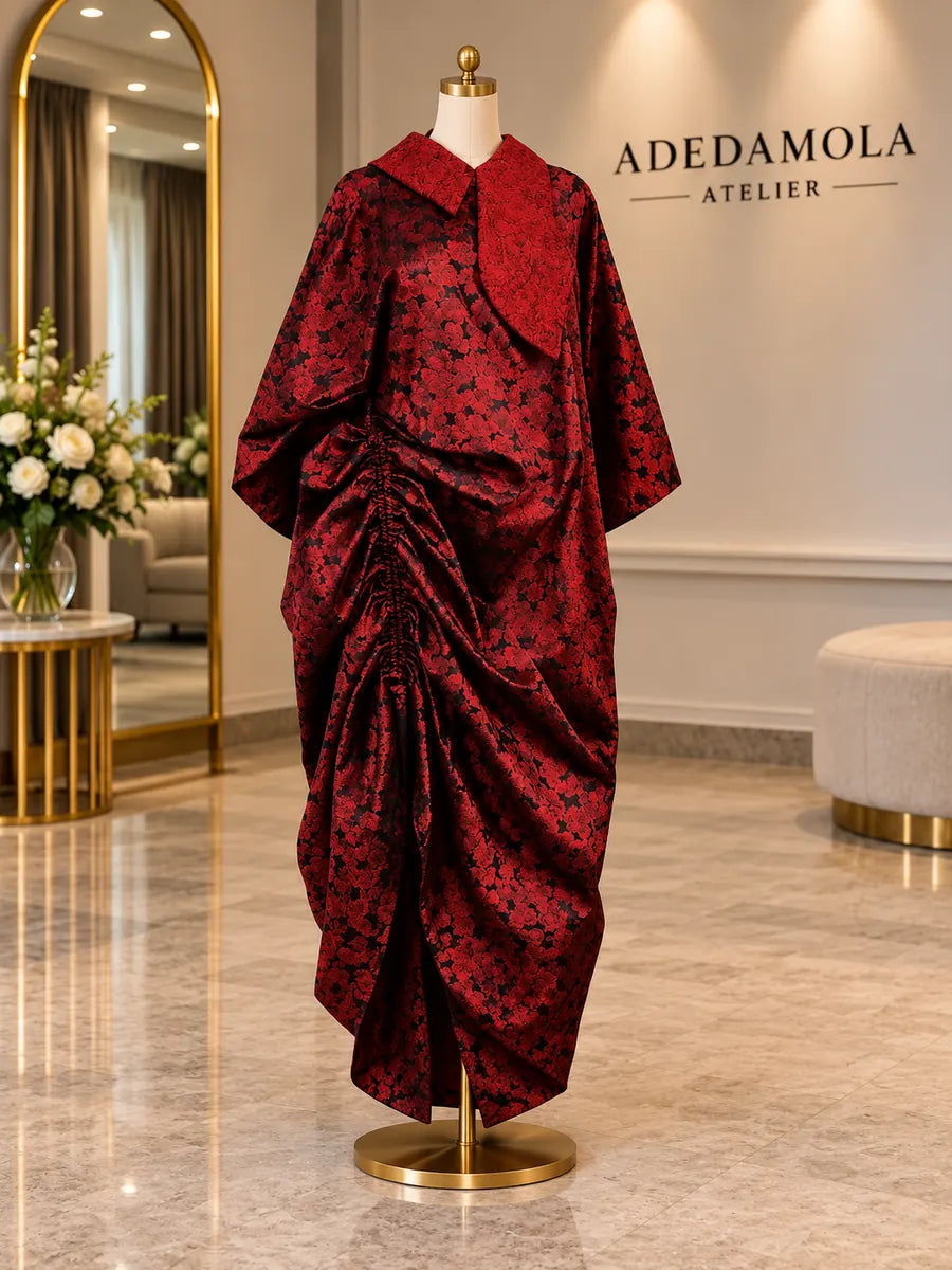 Full-length burgundy floral brocade wrap outfit with asymmetric hand-ruched draping