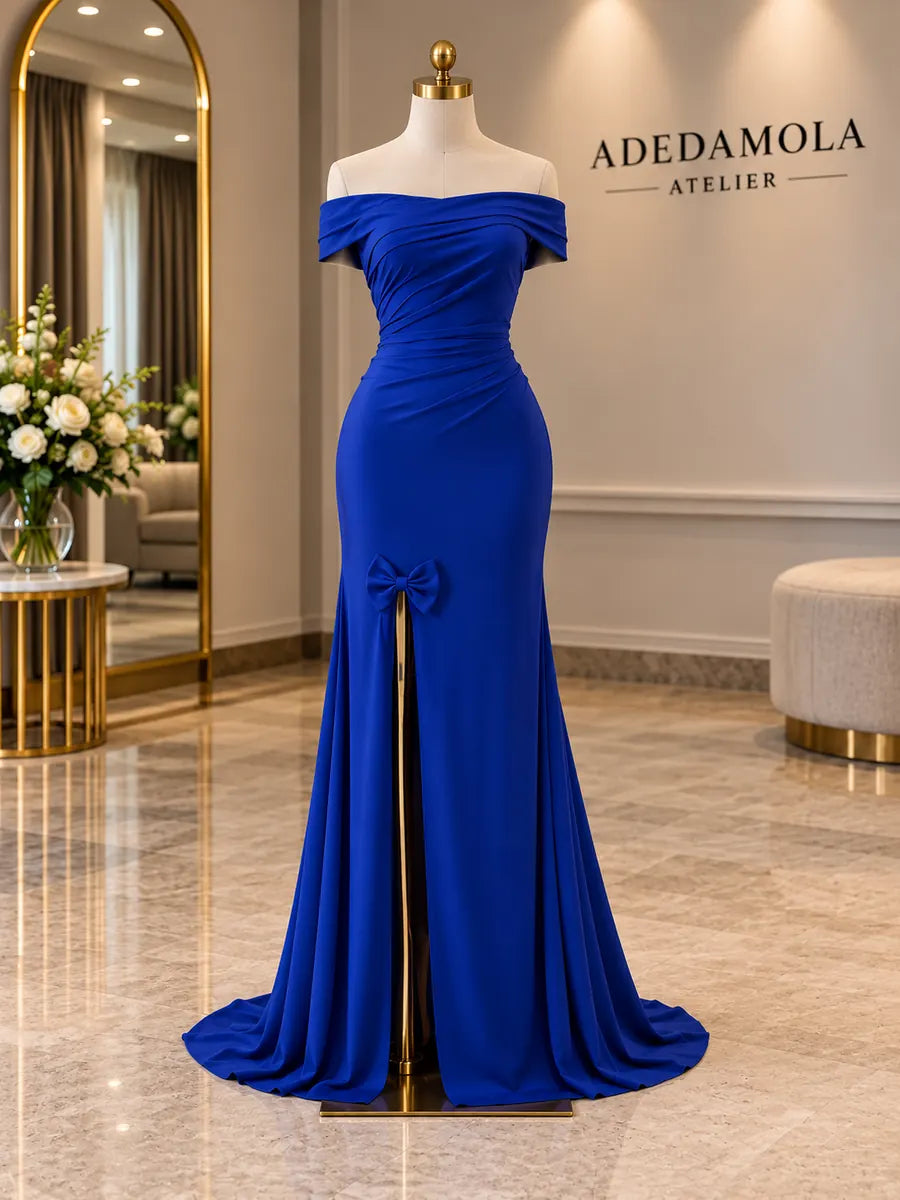 Full-length royal blue off-shoulder jersey gown with high slit and hand-tied bow