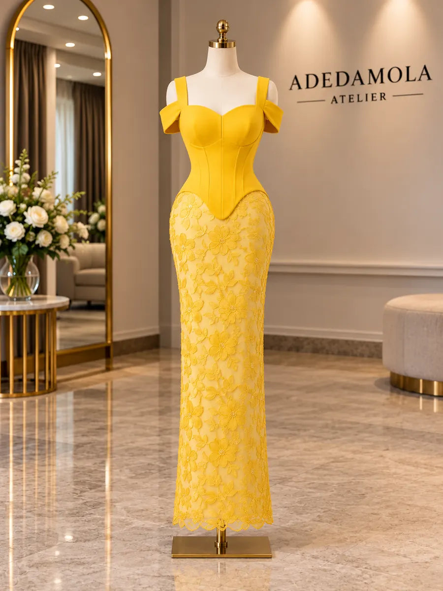Full-length yellow satin corset gown with floral lace skirt and scalloped hem