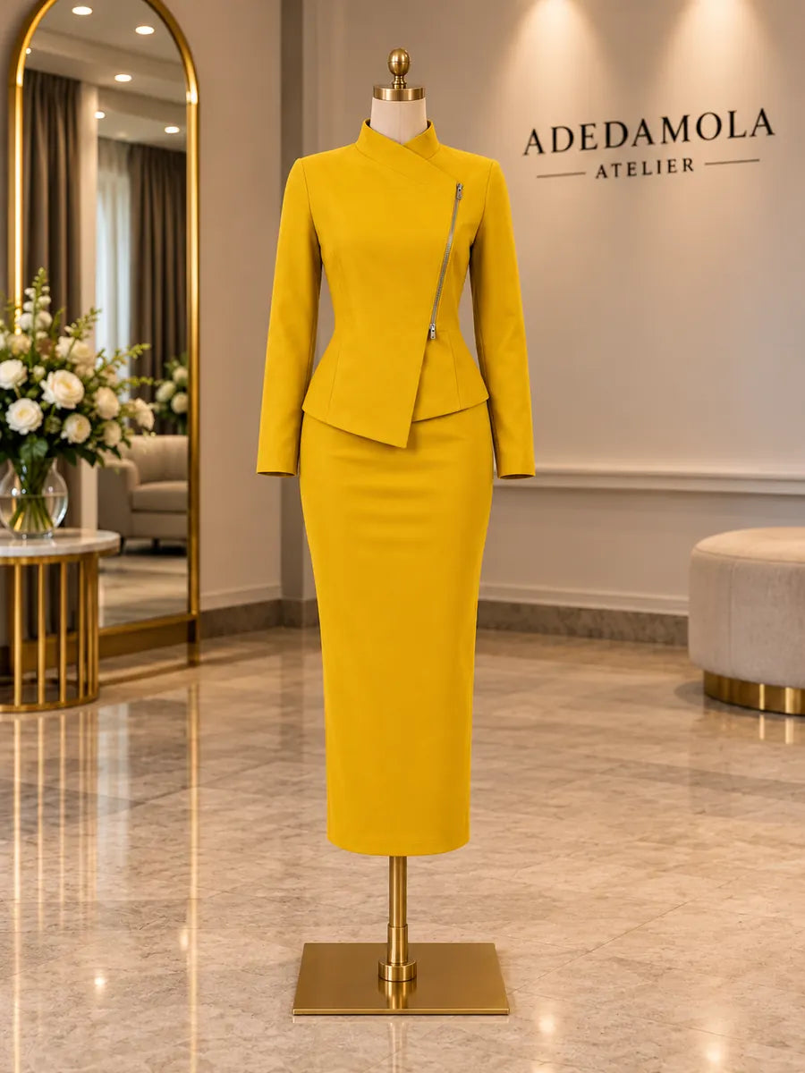 Full-length marigold structured power suit with asymmetric zip jacket and pencil skirt