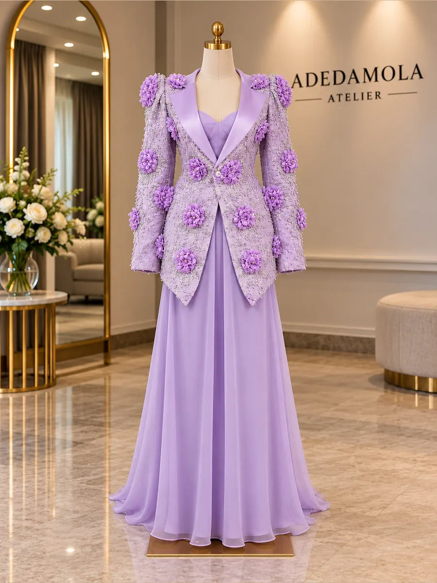 Full-length lilac floral appliqué jacket over a flowing chiffon gown